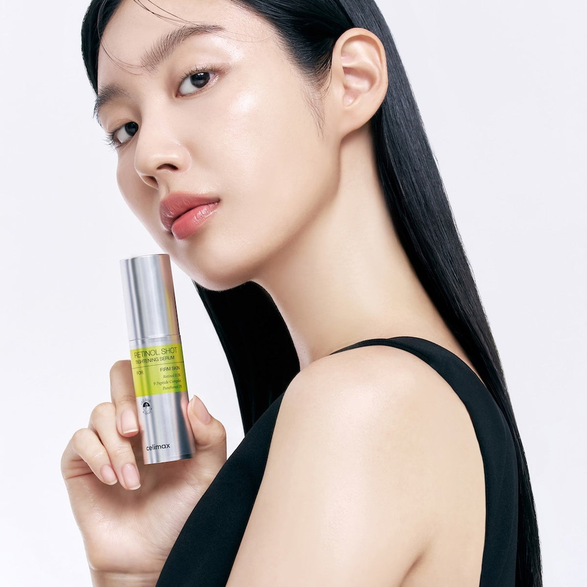 Boîte et flacon du sérum Celimax Vita-A Retinol Shot posés côte à côte